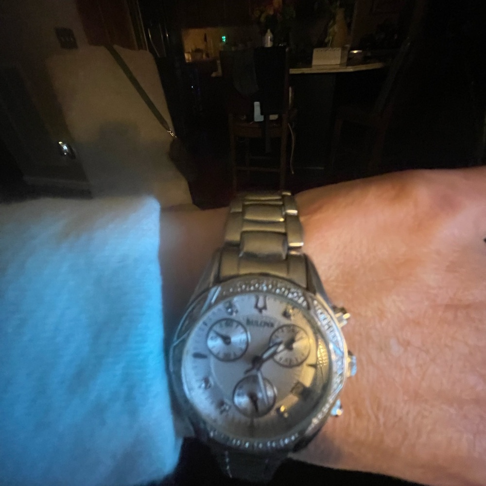 Bulova women’s stainless steel watch with diamonds